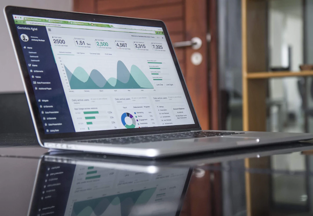 Laptop showing a business dashboard with revenue charts